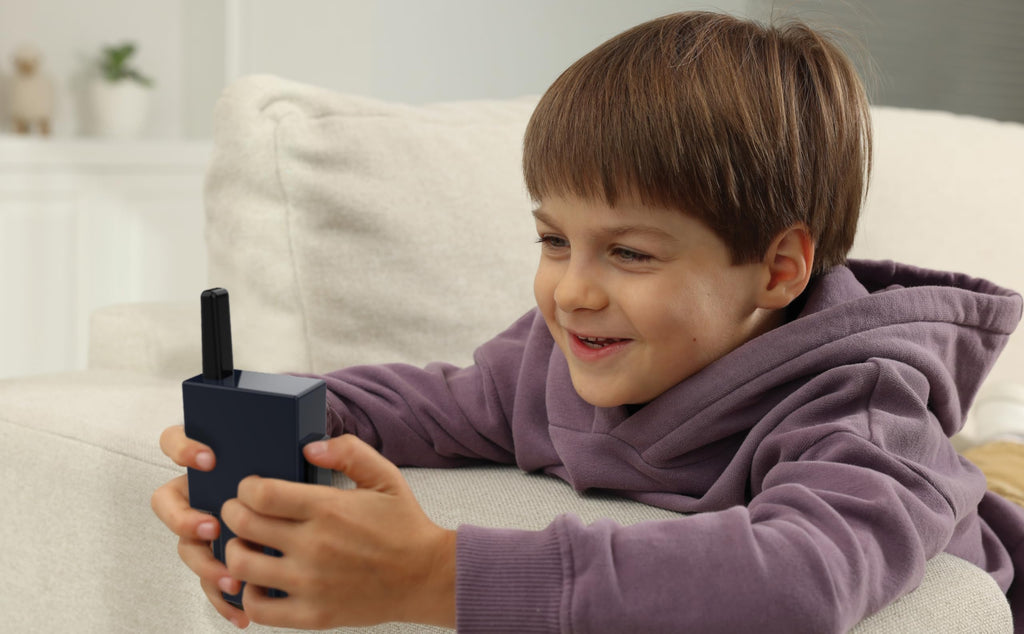 Authentic eKids Minecraft communication toys being used for outdoor backyard games