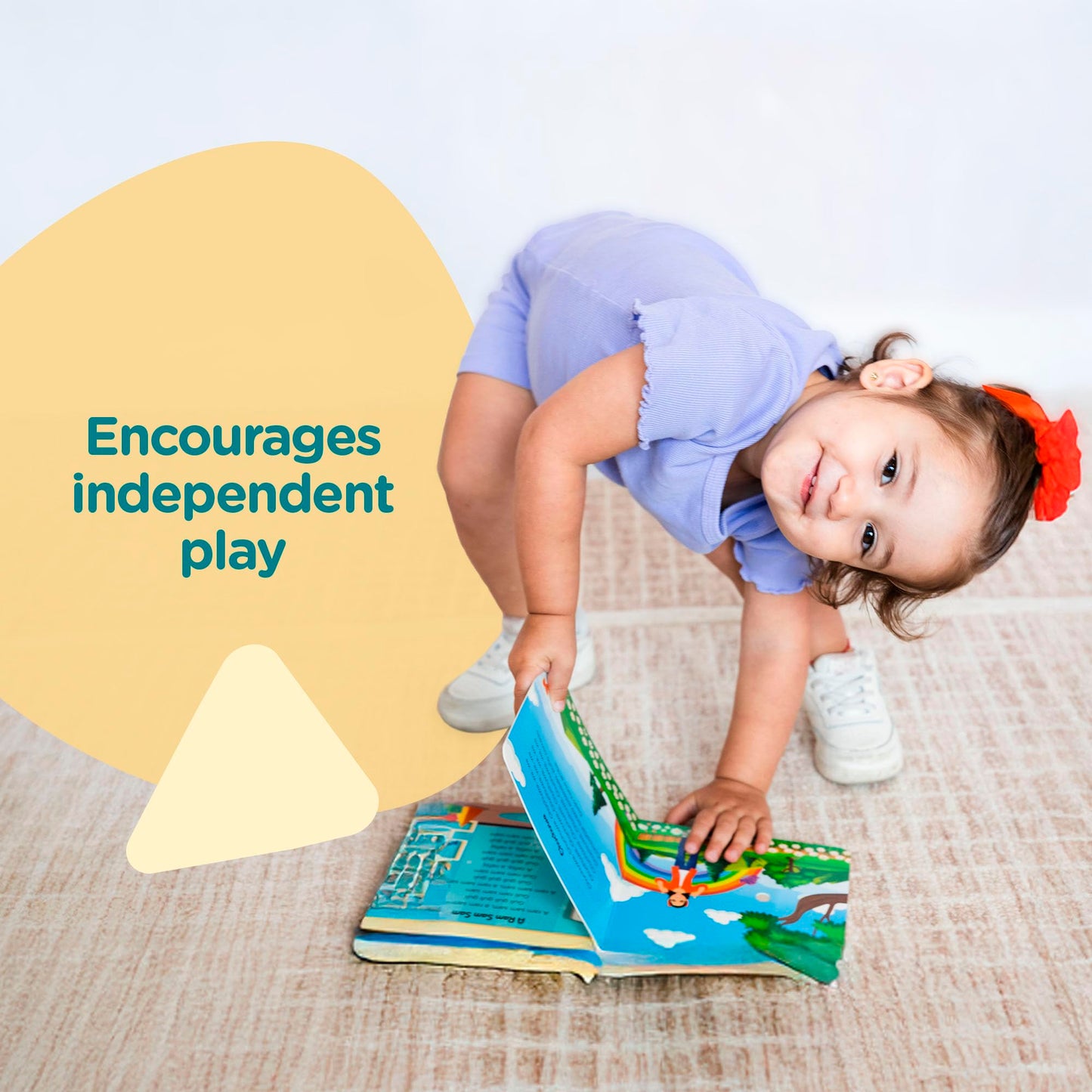 Toddler hands interacting with sound buttons on Aprende Peque book