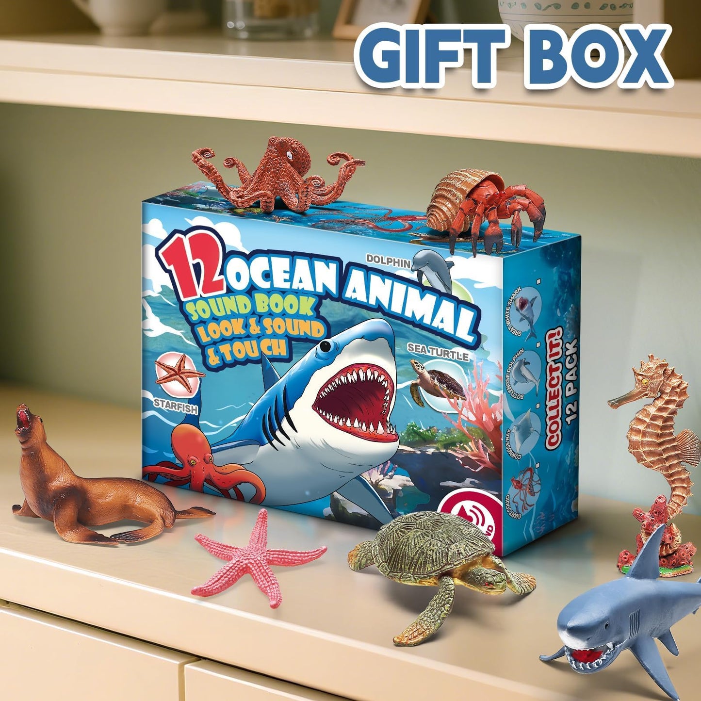 Top view of 12 piece ocean animal toy collection in gift box