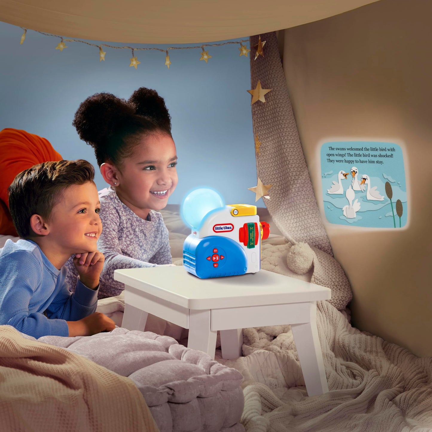 Little Tikes Story Dream Machine projecting fairy tales on a bedroom wall