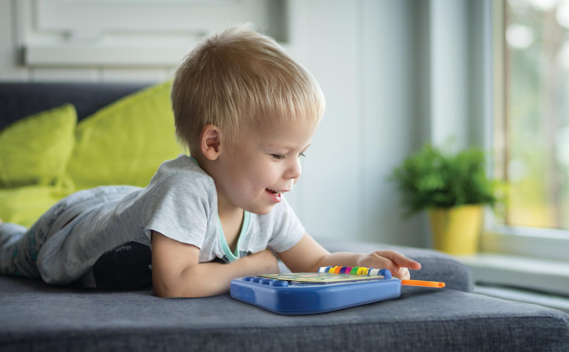 Side view of Ekids Blippi electronic learning book