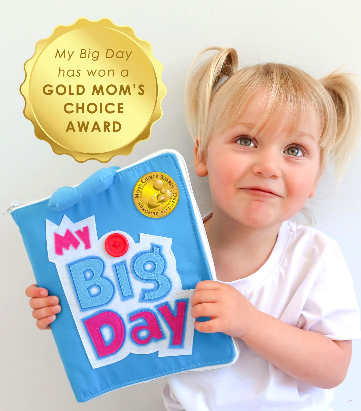 Child learning fine motor skills with busy book
