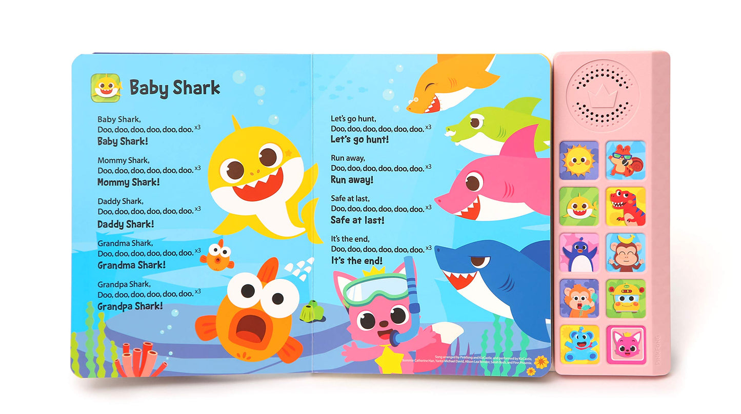 Toddler using interactive sound book during playtime