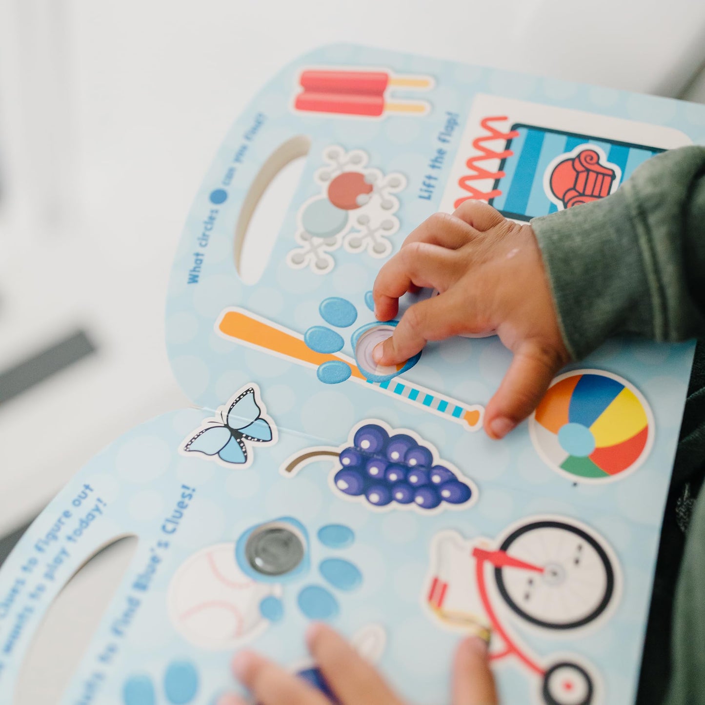 Full spread of the Shapes with Blue interactive board book