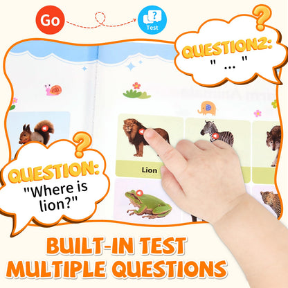 Toddler using Arnbz English sound book in interactive quiz mode