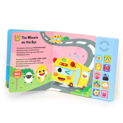 Pinkfong Baby Shark sound book held by a child for scale