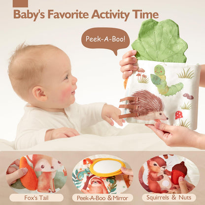 Baby playing with Hahaland sensory book during tummy time