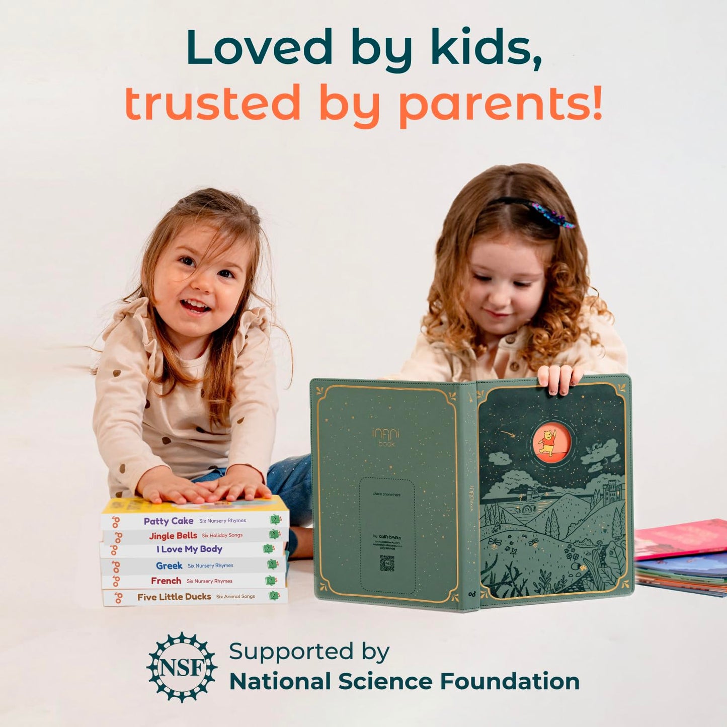 Toddler playing with Cali's Books Wheels on the Bus toy