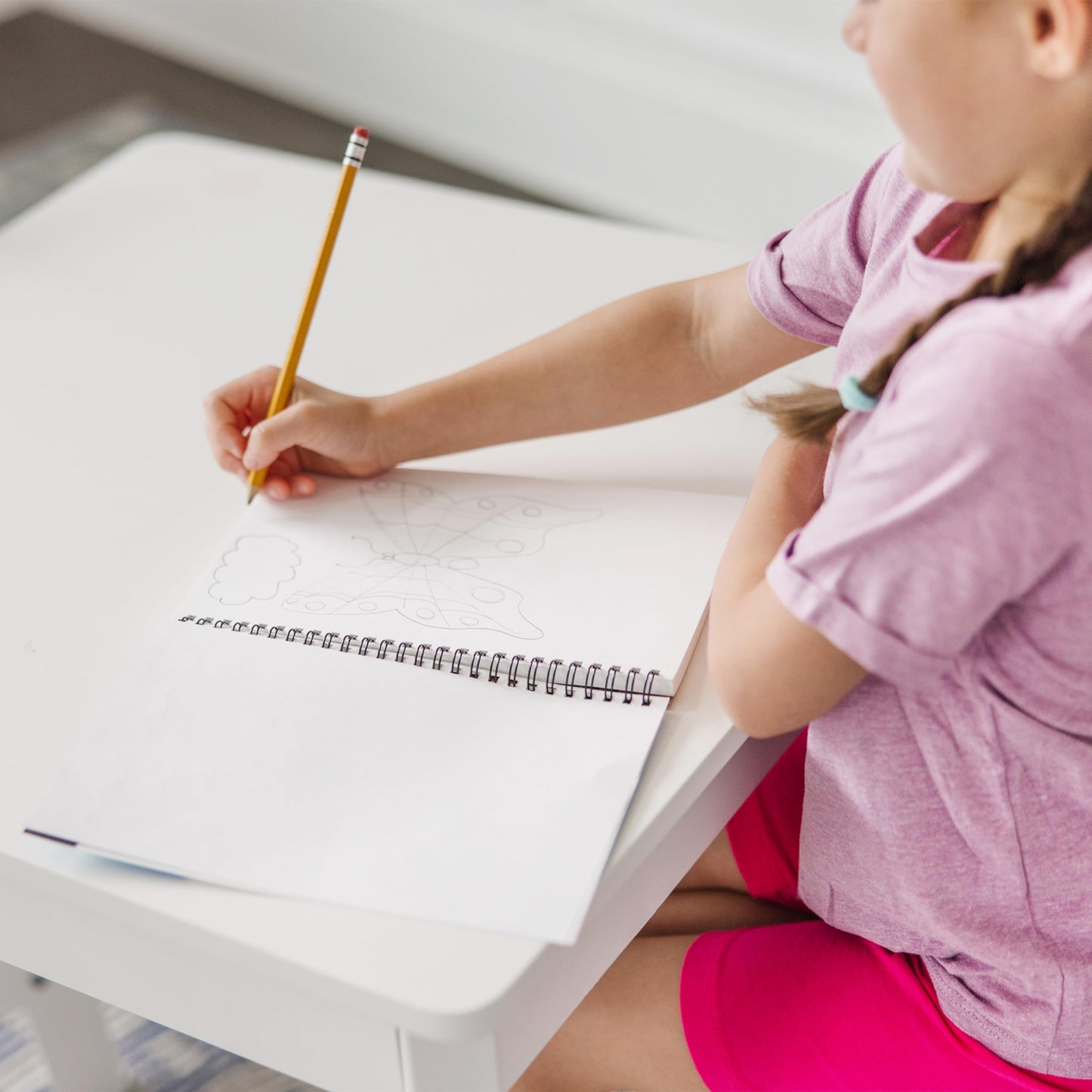 Melissa and Doug Mini Sketch Pad open to sketch starters