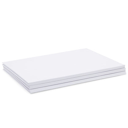 White sketchbooks bundle on a creative workspace