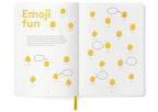 Child using The HappyMe Journal for writing and drawing