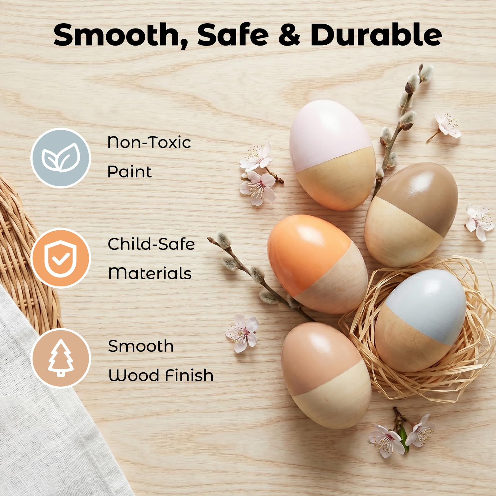 Close up showing the smooth texture and non toxic paint detail of the two by three inch wooden shakers