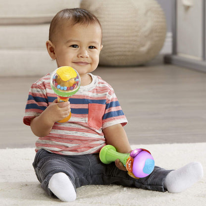 Side view of LeapFrog bilingual learning maracas showcasing the ergonomic handle grip for infants.
