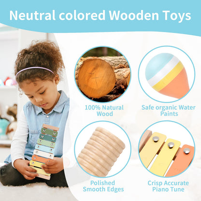 Toddler holding natural wood tambourine and maracas from the nine piece educational set