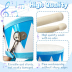 Two matching wooden drumsticks lying next to the eight inch baby drum toy