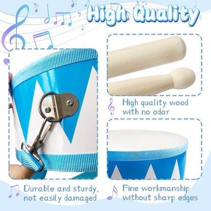 Two matching wooden drumsticks lying next to the eight inch baby drum toy