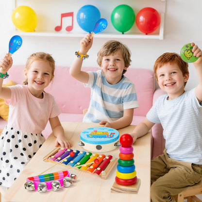 Close up view of the childom eight note rainbow xylophone with two child safe wooden mallets resting on top