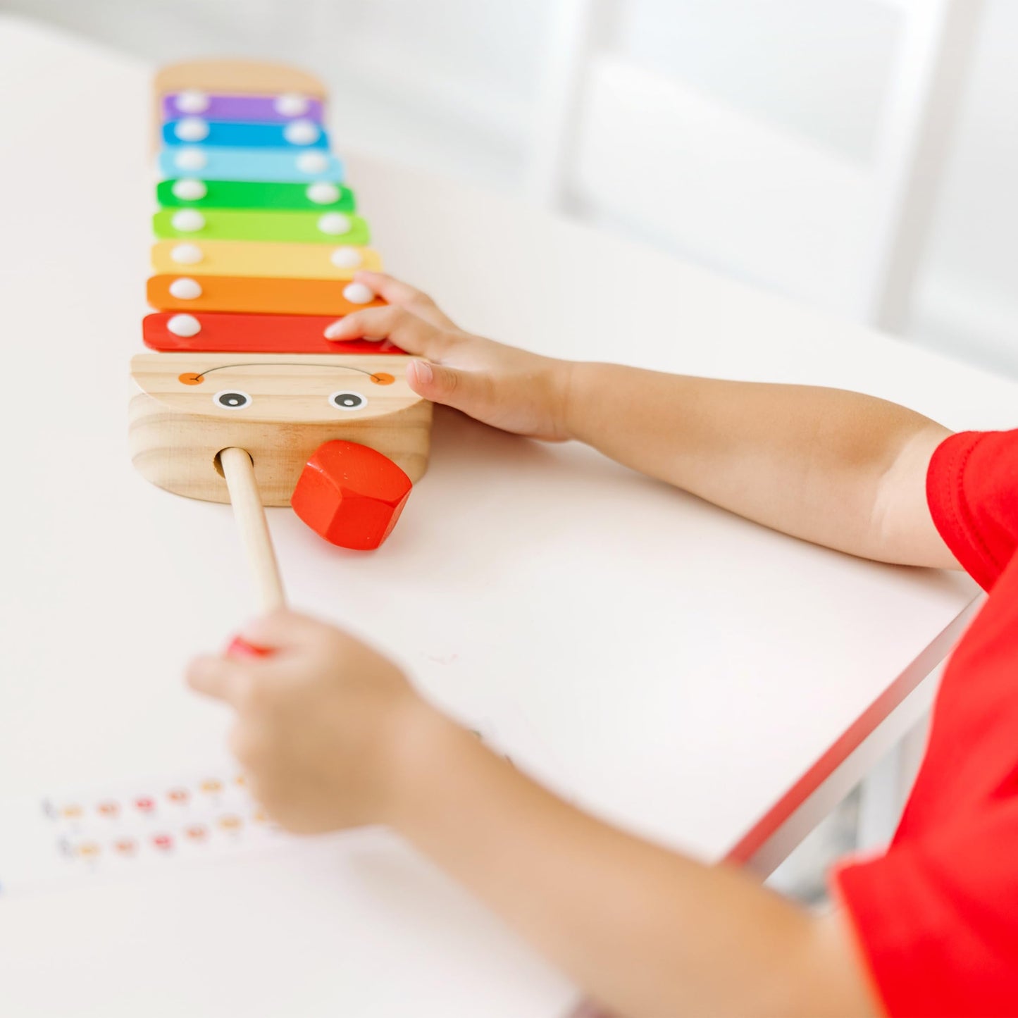 Melissa & Doug educational preschool toy for developing fine motor skills through play.
