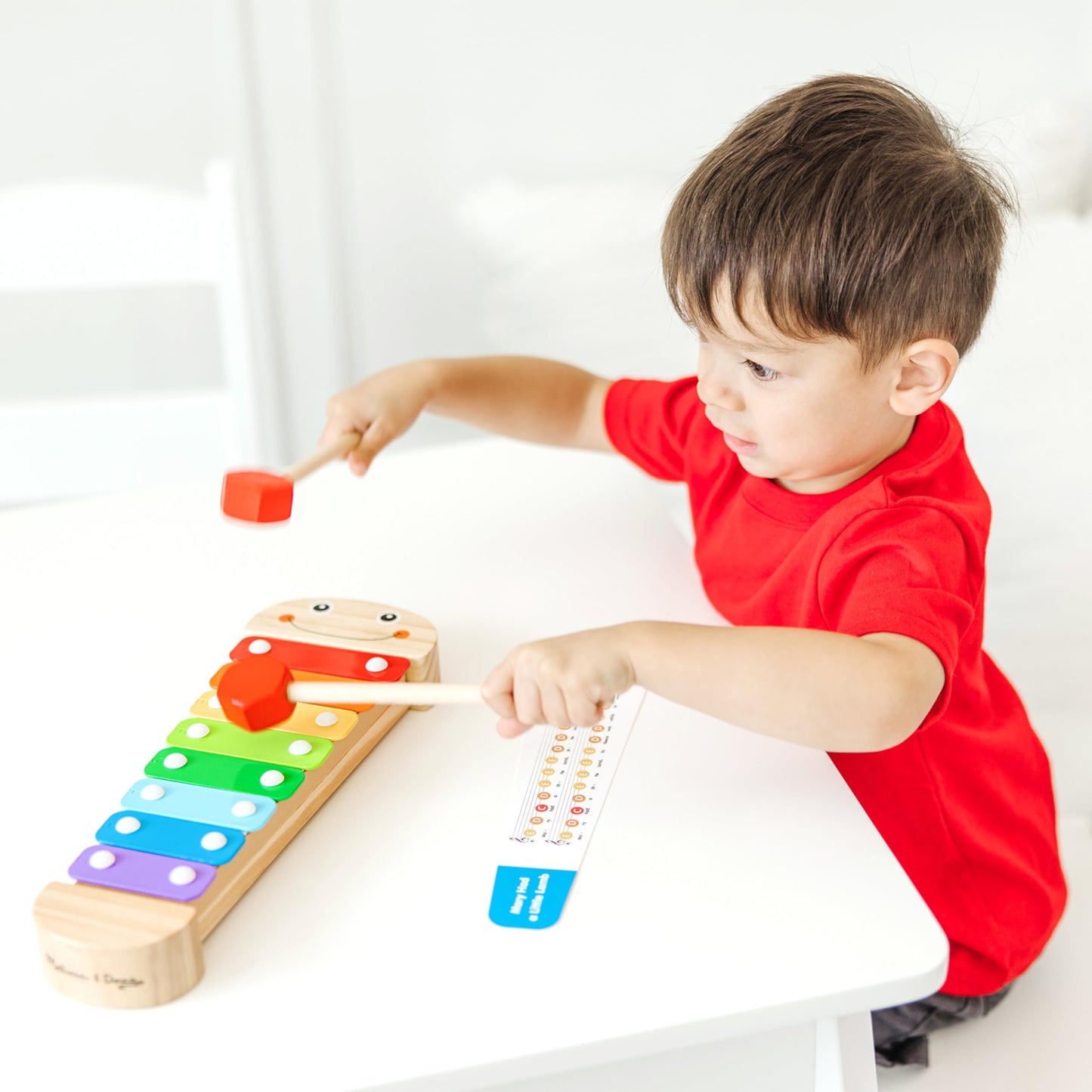Premium quality wooden caterpillar musical set showcasing the full one octave scale layout.