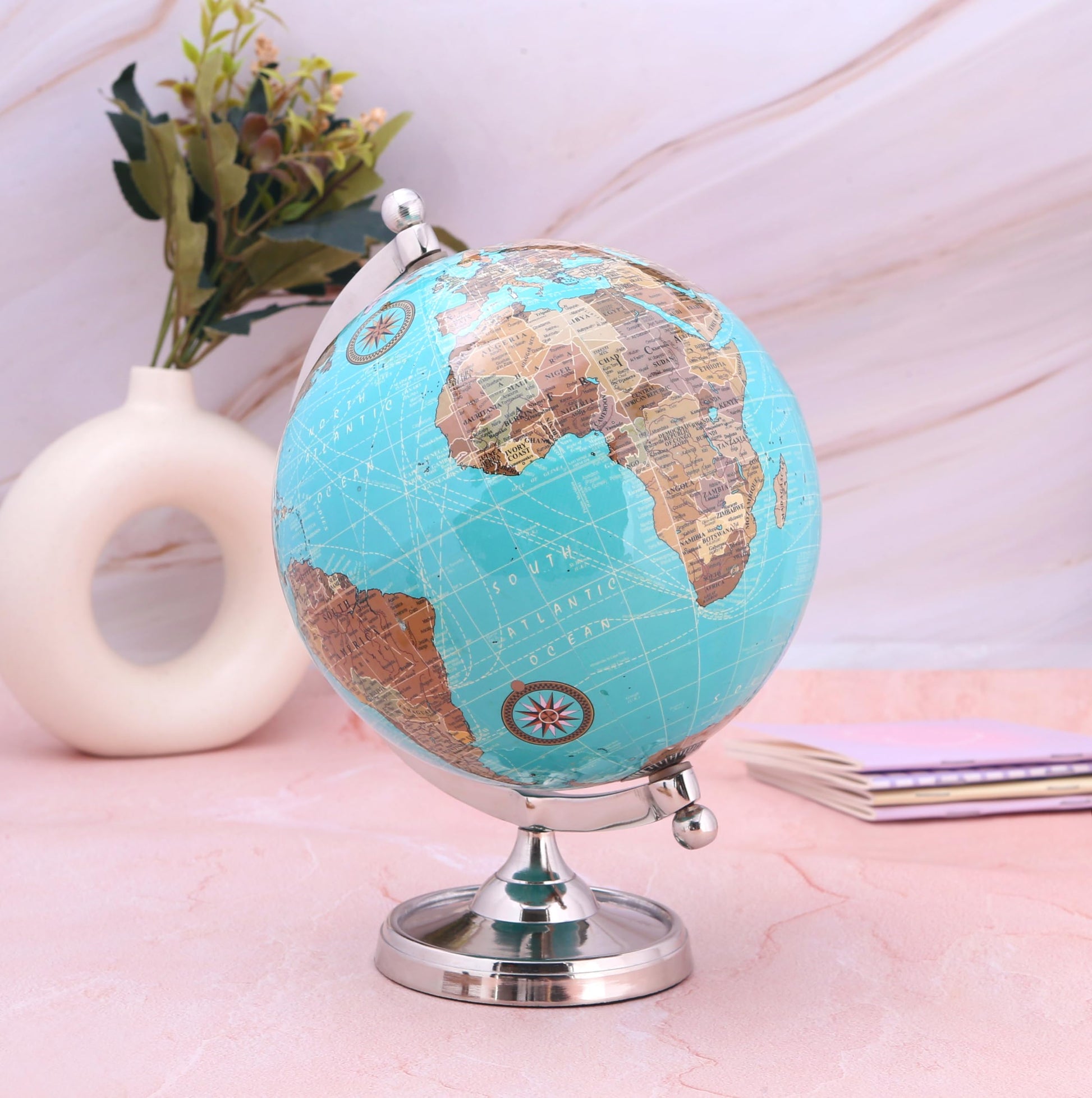 Rely+ light blue world globe on gold metal base