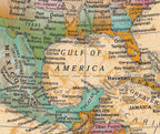 Replogle 12 Inch antique desktop globe displaying detailed raised relief mountain ranges and country names.