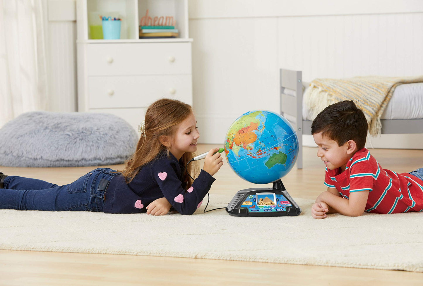 Educational LeapFrog interactive globe base and control buttons.