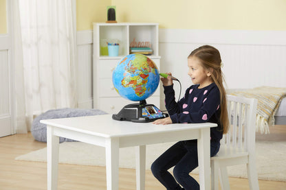 LeapFrog Magic Adventures Globe in a bright playroom setting.
