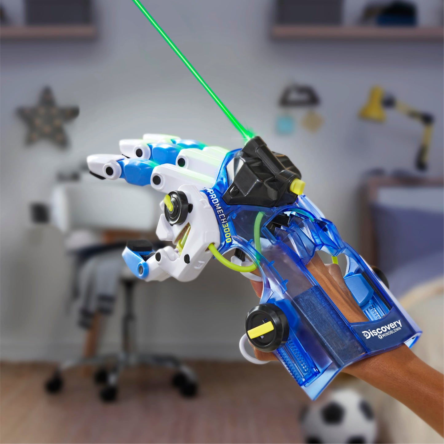Discovery DIY STEM mechanical hand model being worn by a child showing real water-powered movement.