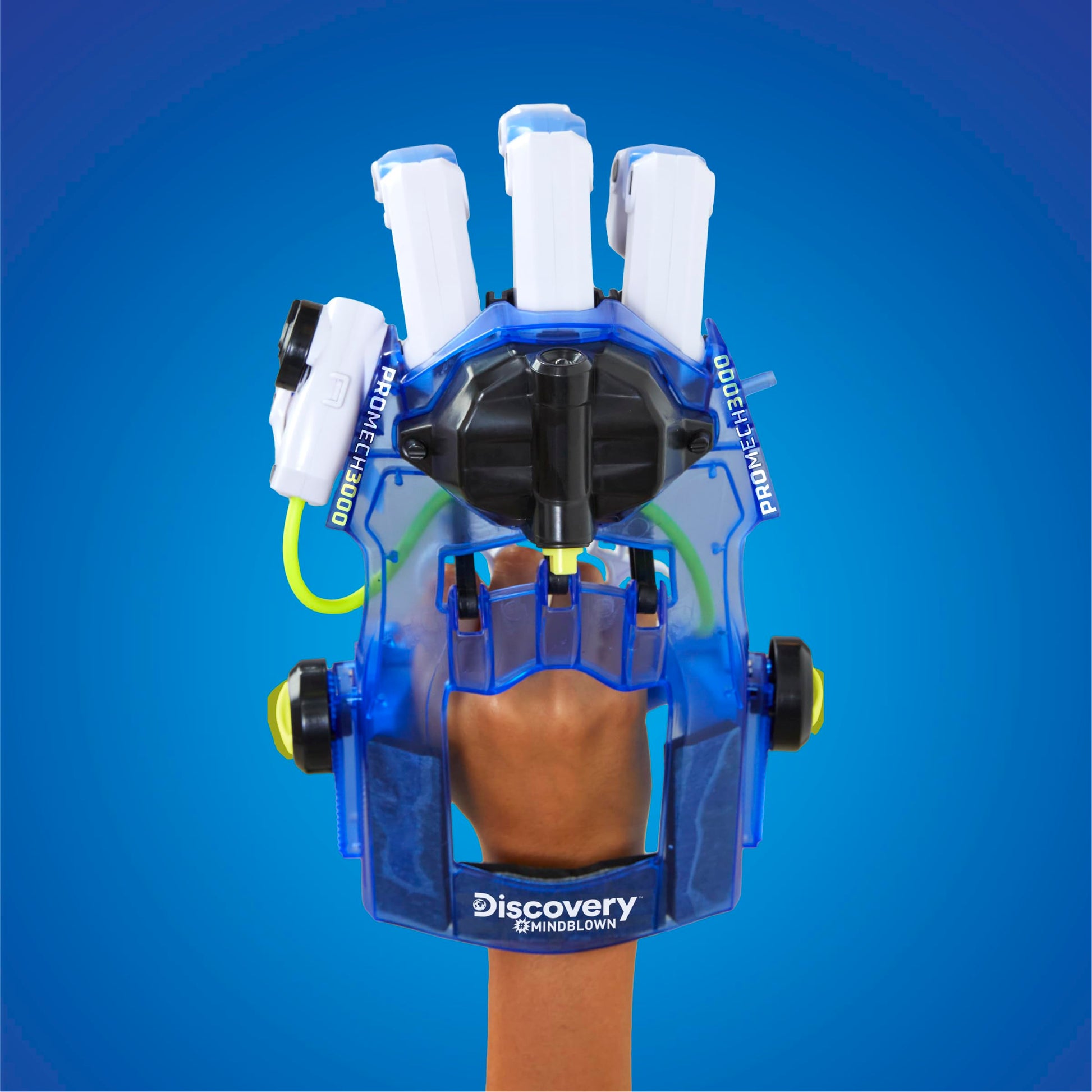 Discovery superhero cyborg toy being used by a child to grip objects using fluid pressure mechanics.