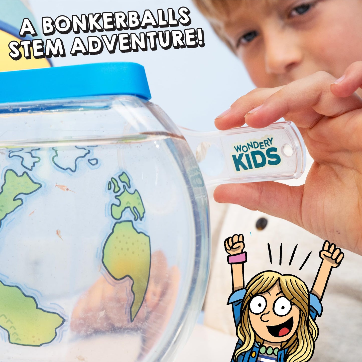 Open box view of the educational kit including shrimp eggs special salt food and illustrated guide book