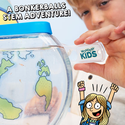 Open box view of the educational kit including shrimp eggs special salt food and illustrated guide book