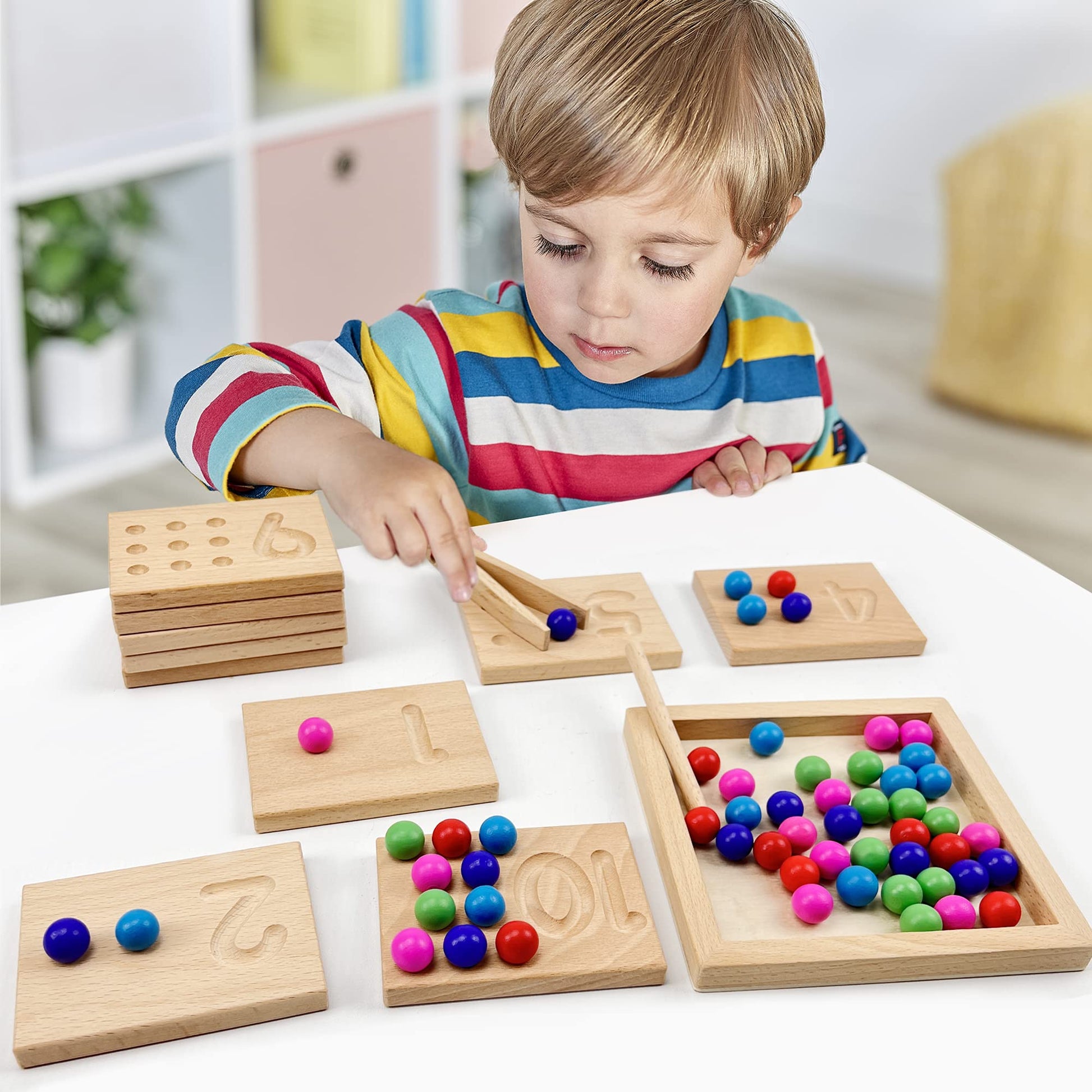 Natural beech wood tracking tiles neatly arranged with wooden storage tray