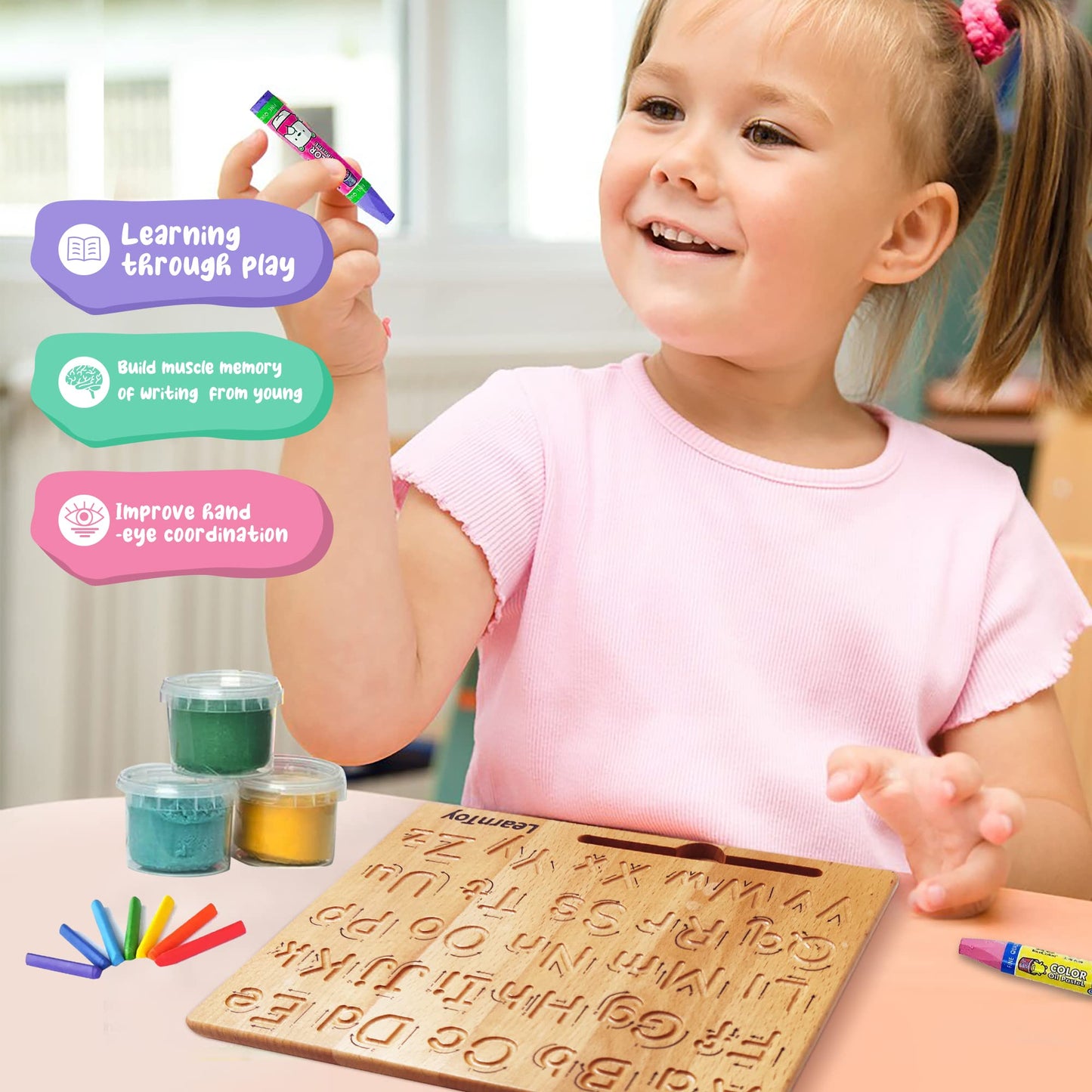 LearnToy preschool handwriting training board being used by a child to develop fine motor skills and muscle memory.