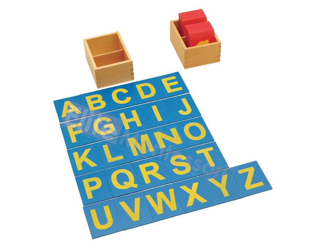 Close up view of textured sandpaper alphabet letters on colored wooden boards for sensory learning