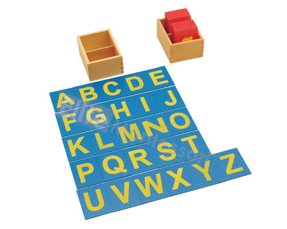 Close up view of textured sandpaper alphabet letters on colored wooden boards for sensory learning