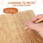 Close up of the directional arrows and engraved grooves on the Asweets wooden alphabet board