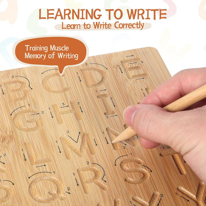 Close up of the directional arrows and engraved grooves on the Asweets wooden alphabet board