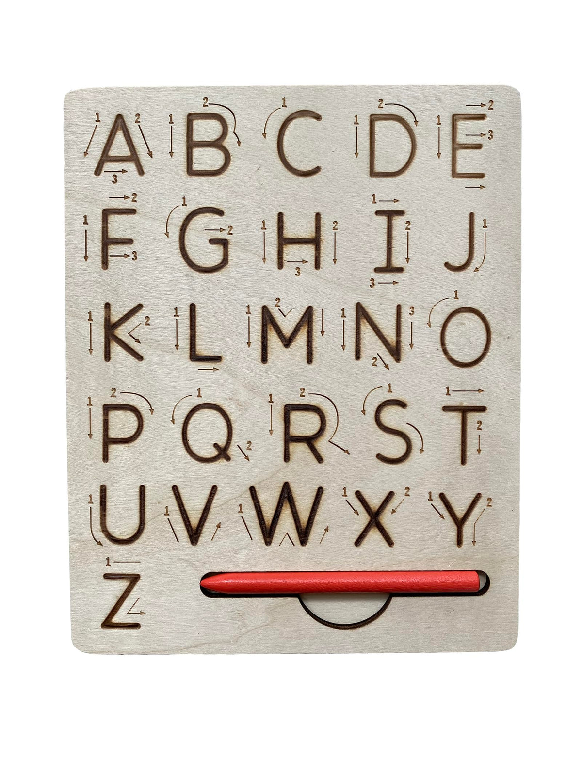 Toddler practicing pencil grip and alphabet formation using the wooden stylus on the grooved board
