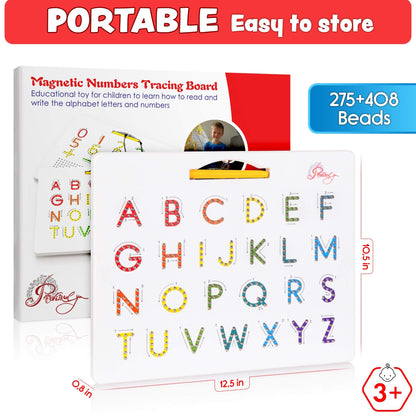 Toddler using the magnetic stylus pen on an educational Montessori learning board.