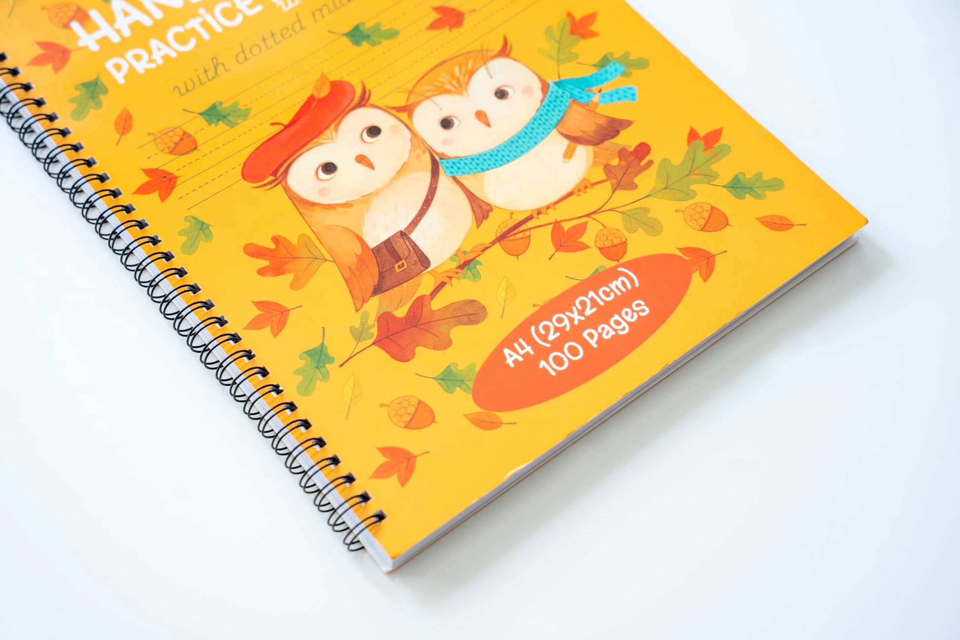 Close up of the spiral binding on the Learning Owl kids writing practice notebook.