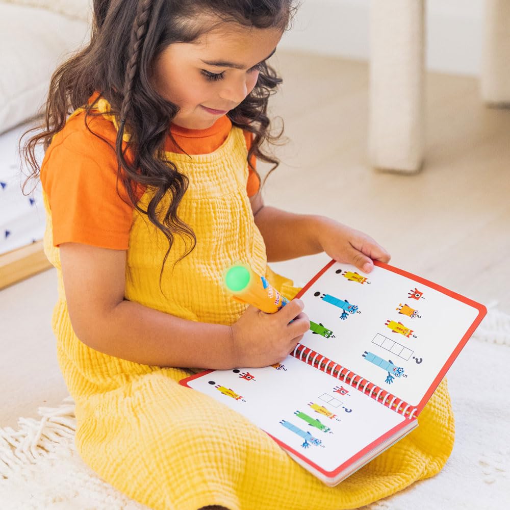 Full contents of the Educational Insights math kit including the 60-page book and electronic pen