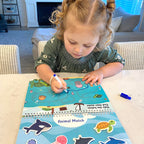 Sensory busy book open to the USA map and emotional awareness theme pages.