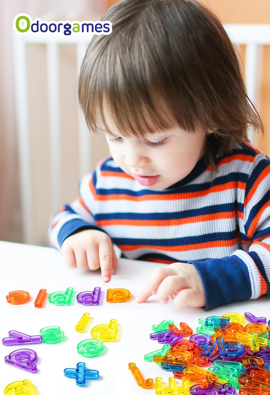 Close up view of overlapping translucent letters illustrating color mixing principles for kids.