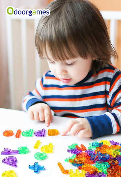 Close up view of overlapping translucent letters illustrating color mixing principles for kids.