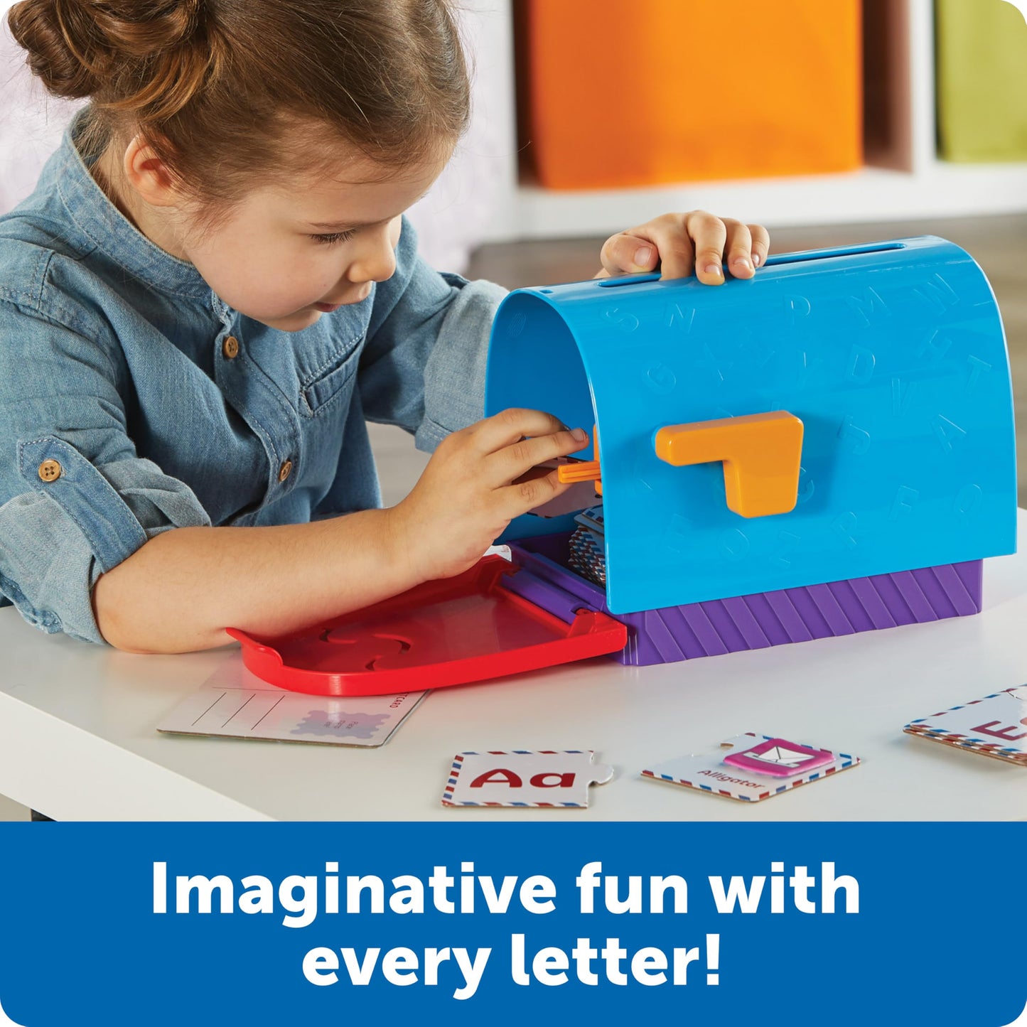 Close-up of the thirty reusable vocabulary stamp stickers included in the Montessori alphabet playset.