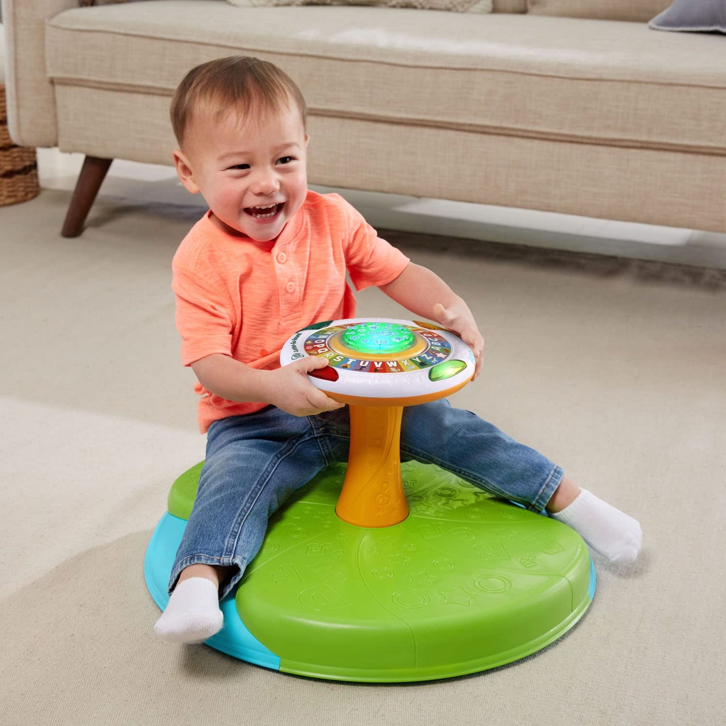 LeapFrog alphabet sit and spin toy inside frustration free packaging box