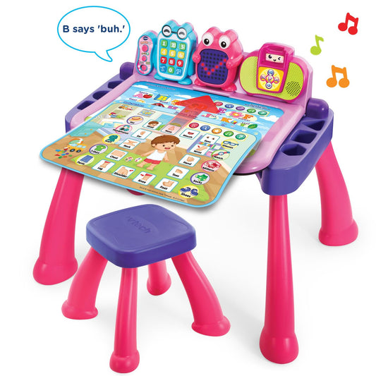 VTech Touch and Learn Activity Desk Pink converted into a toddler art easel position