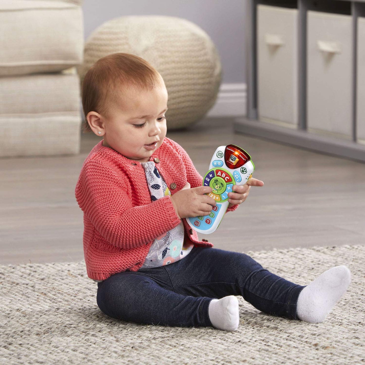 Side view of LeapFrog infant learning remote showing the durable plastic design for small hands.