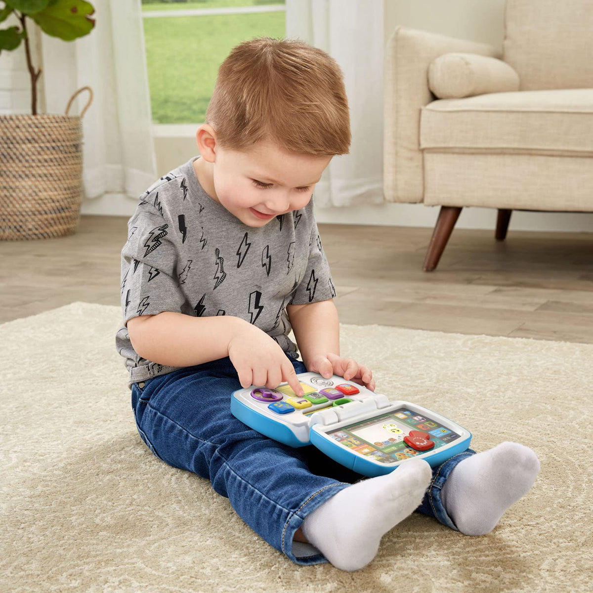 Side view profile of the lightweight and durable VTech toddler computer toy.