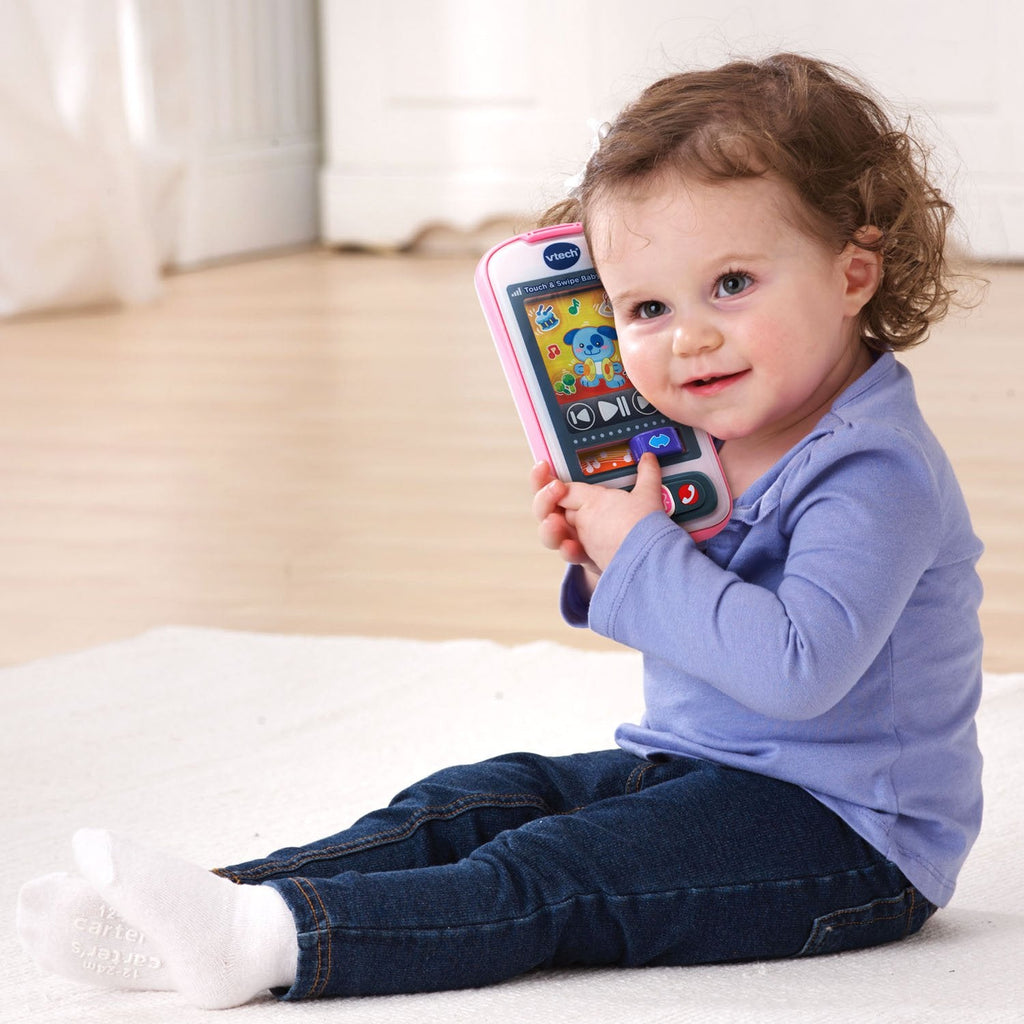 Close up view of the colorful app touch icons on the VTech pink phone.